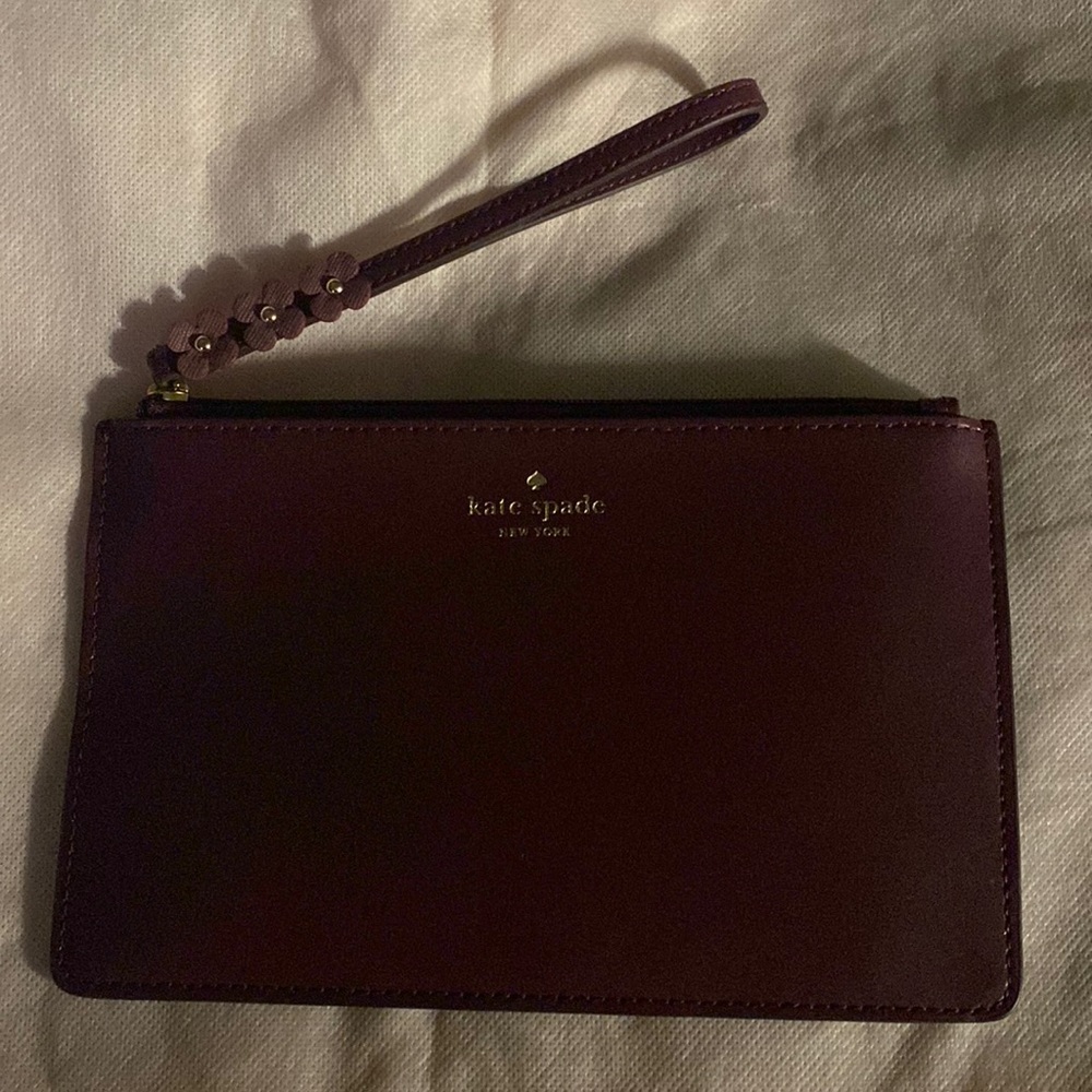 Kate Spade wristlet in deep purple